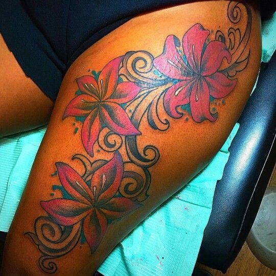 Flowing Floral Tattoo on the Thigh Tattoo Design