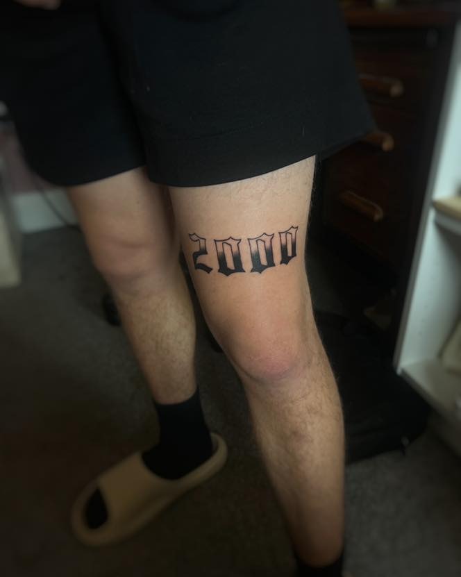 Bold Date Tattoo Representing a Significant Year Tattoo Design