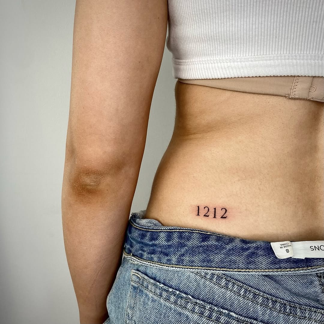 Minimalist date tattoo on woman’s body Tattoo Design