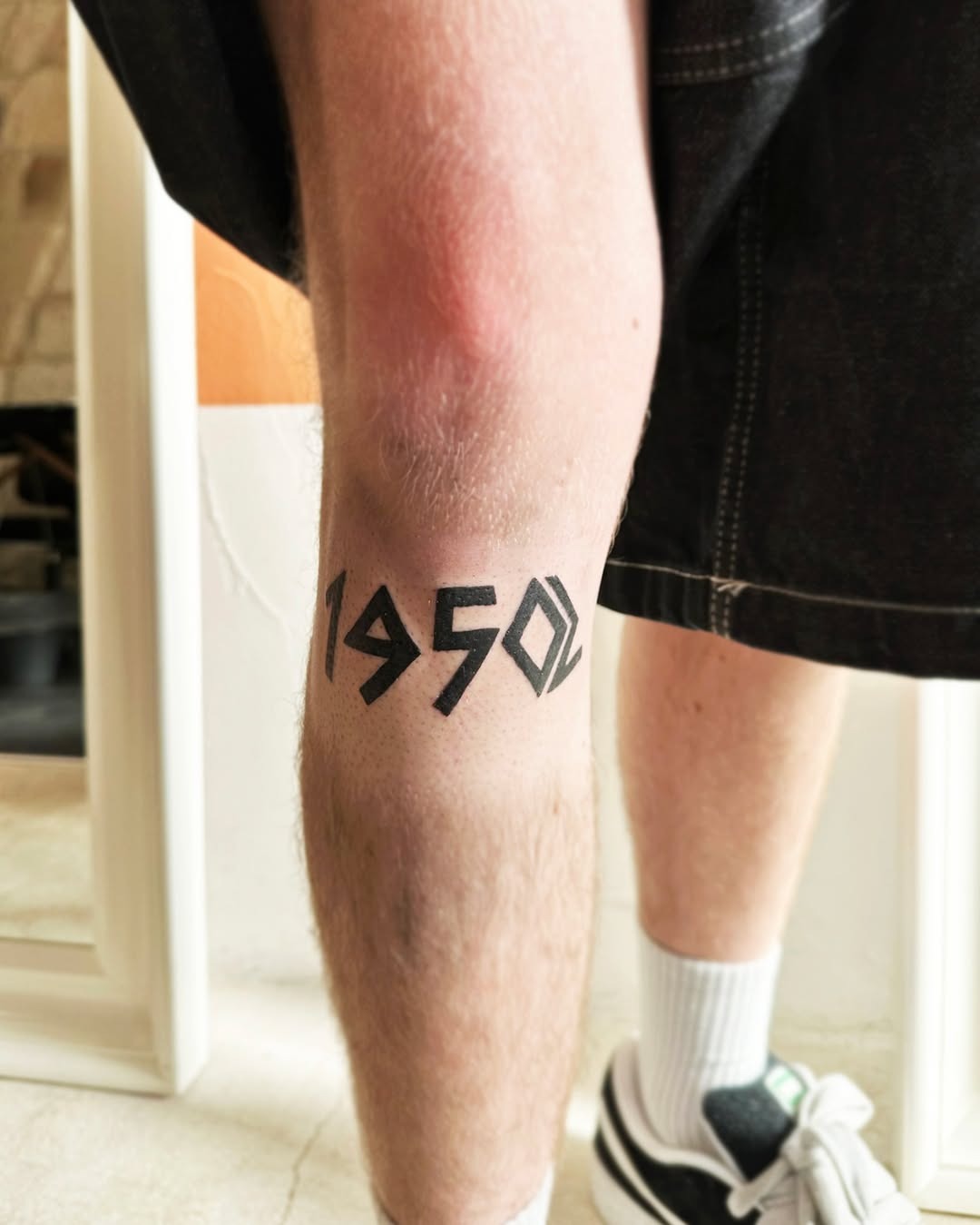 Modern 1950 Date Tattoo with Sharp Angles Tattoo Design