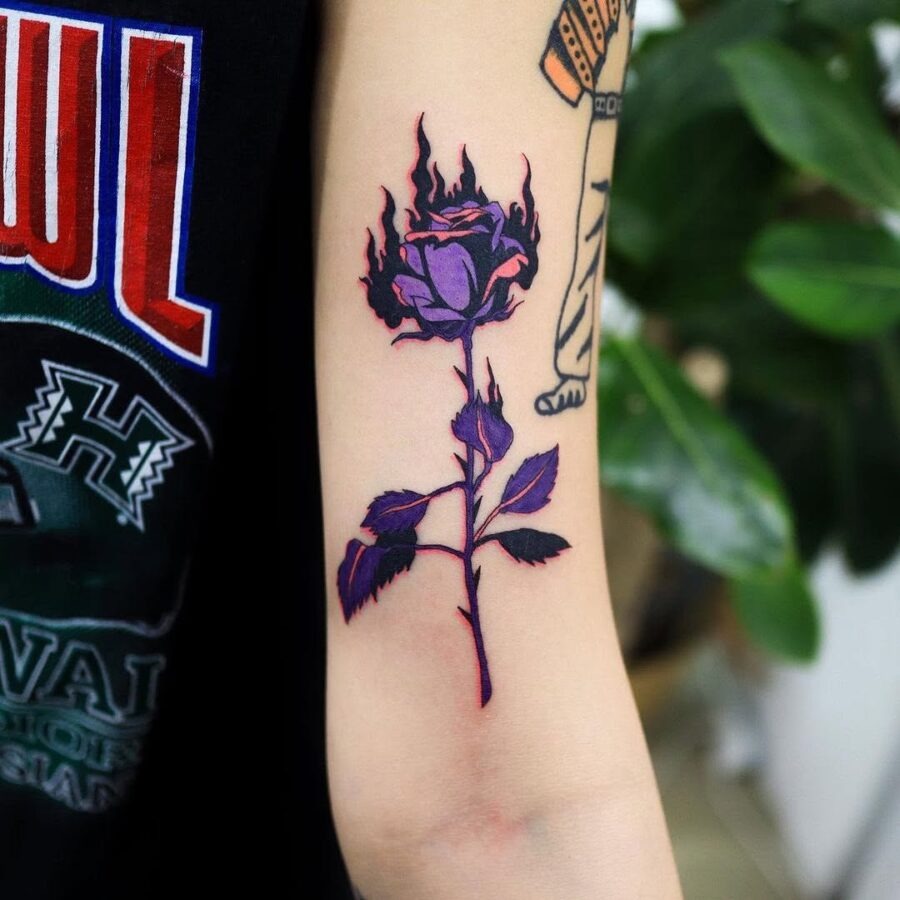 A striking rose tattoo adorned with flames Tattoo Design