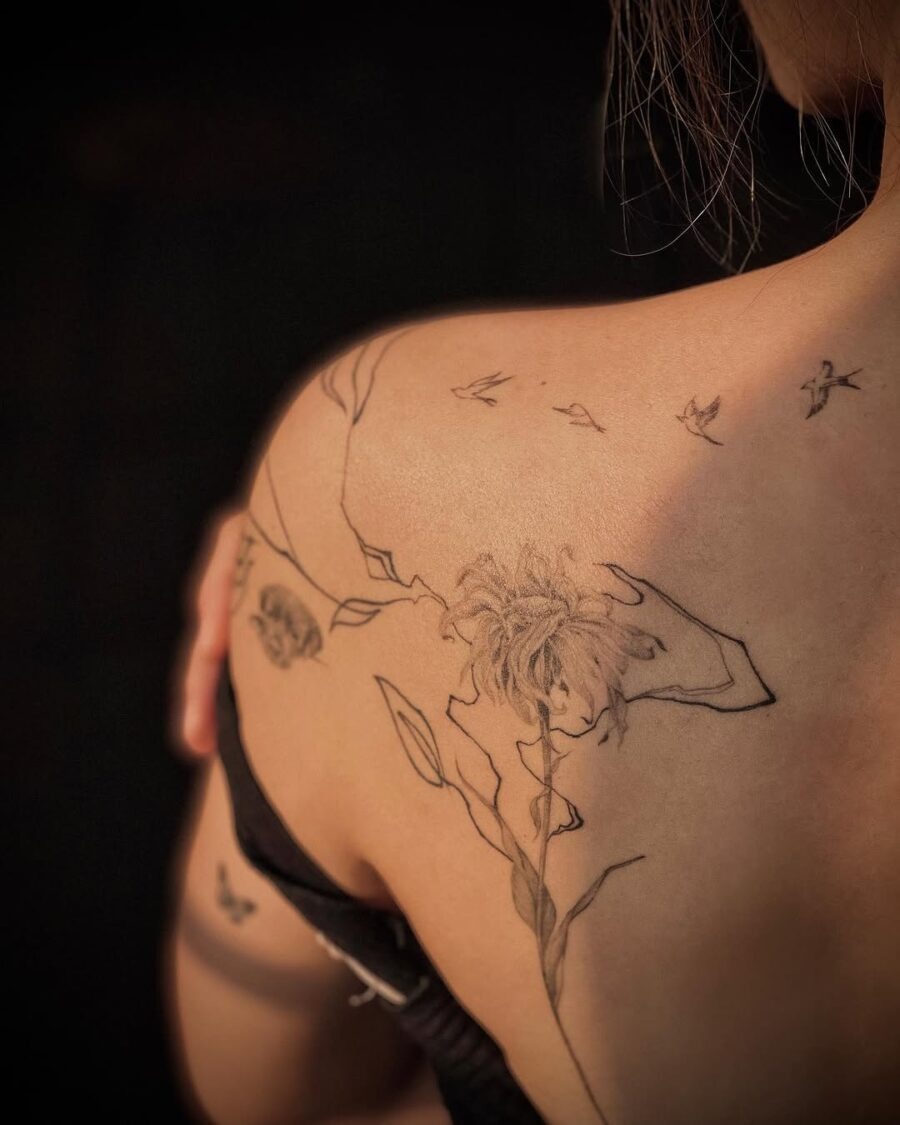 Artistic dead flower tattoo with delicate details Tattoo Design