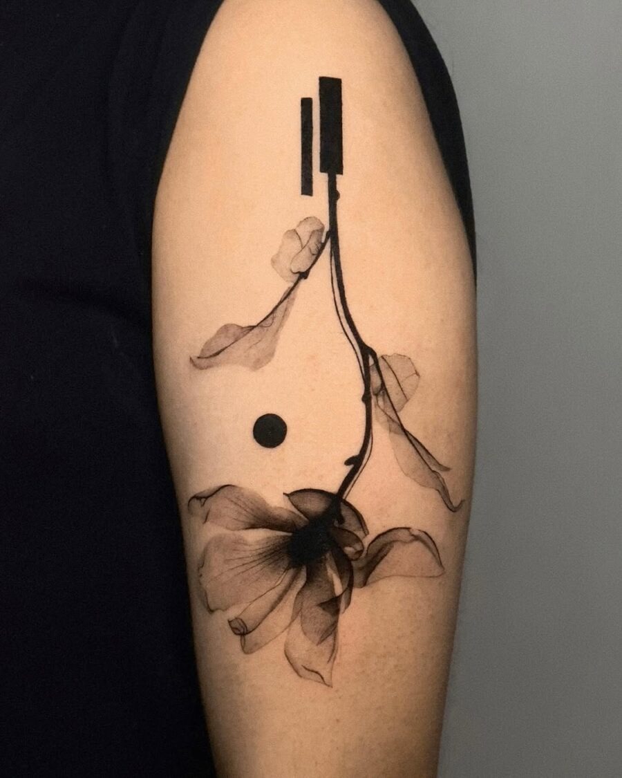 Artistic interpretation of death through floral ink Tattoo Design