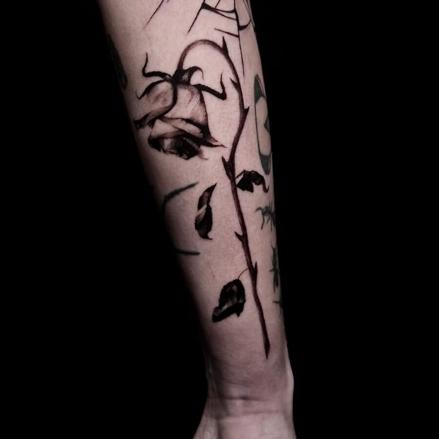 Elegant black and grey dead flower tattoo. Tattoo Design