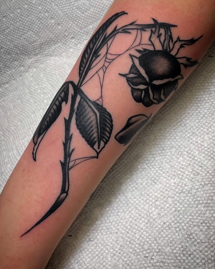 Elegant black ink dead flower tattoo design Tattoo Design
