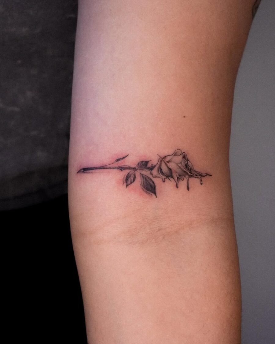 Elegant dead rose tattoo with subtle details Tattoo Design