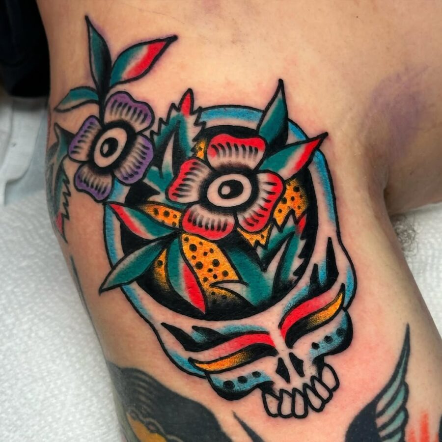 Vibrant dead flower skull tattoo with leaves Tattoo Design