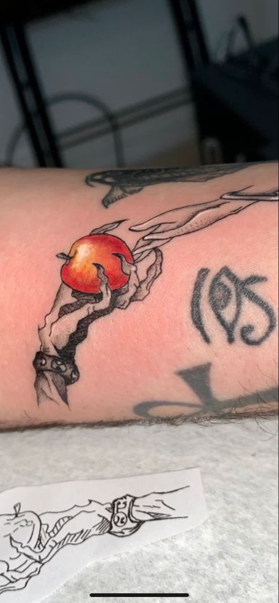 Apple of Temptation Hand-to-Hand Motif Tattoo Design