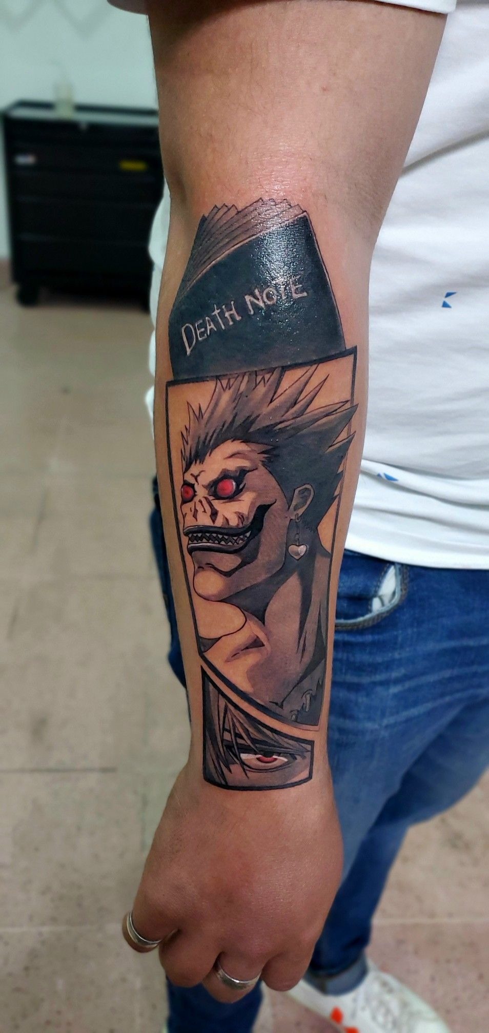 Color-Pop Ryuk With Death Note Cover Tattoo Design