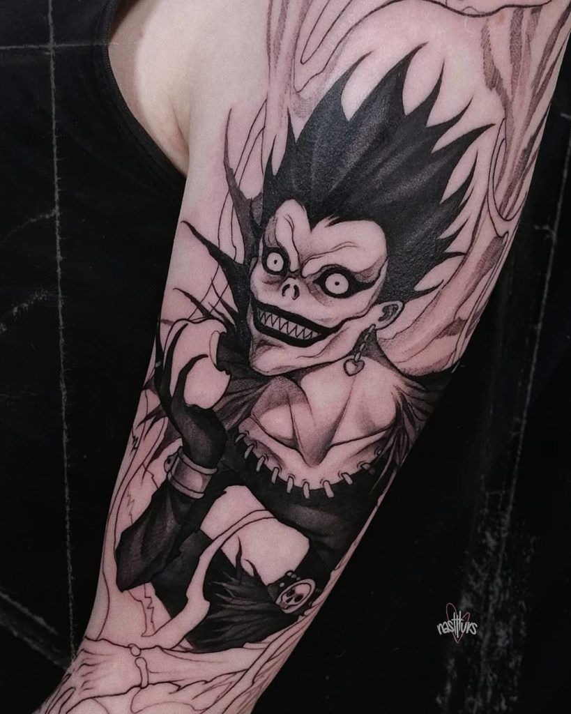 Elegant Blackwork Ryuk Portrait Tattoo Design