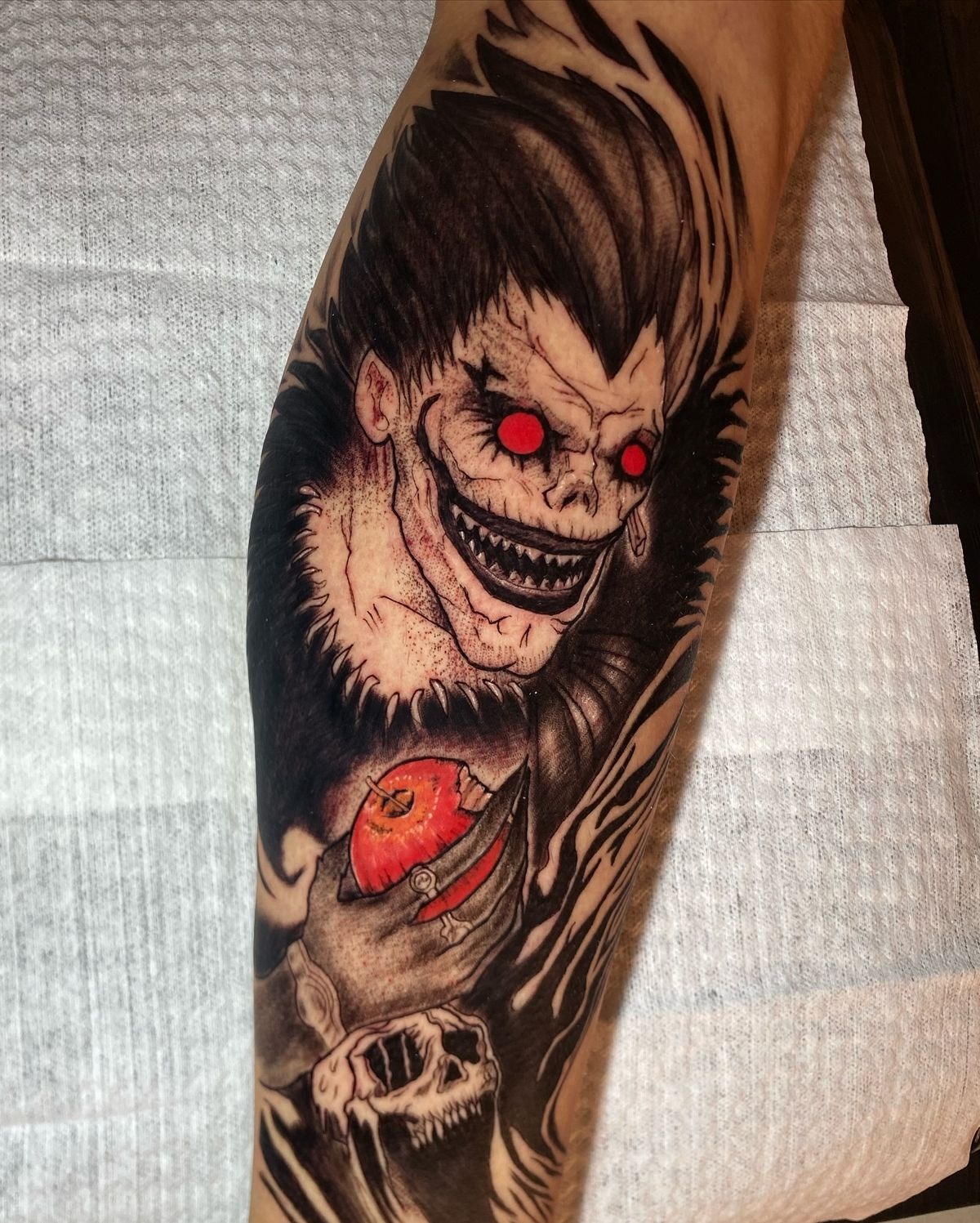 Ryuk With Apple and Skull Composition Tattoo Design