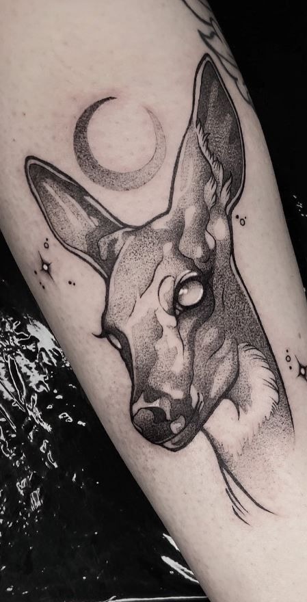 Dainty Doe with Crescent Moon, a tattoo design rendered in clean detailed linework.