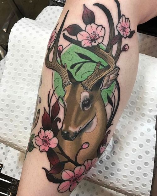 Deer with Blossoms and Green Halo, a tattoo design rendered in delicate fine-line for the back.