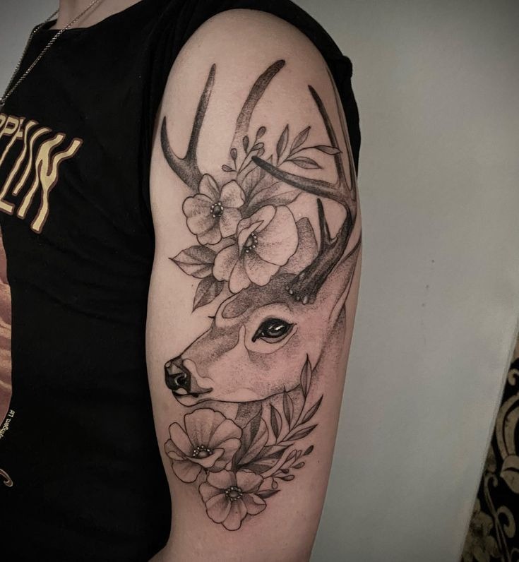 Deer with Floral Accents, a tattoo design rendered in clean detailed linework.