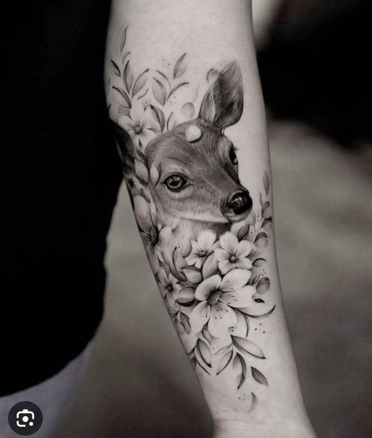 Floral Framed Fawn, a tattoo design rendered in fine-line for the forearm.
