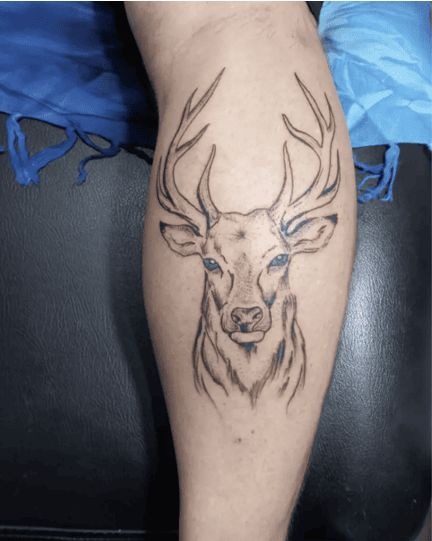 Minimalistic Deer Head tattoo, a tattoo design rendered in sketch-style.