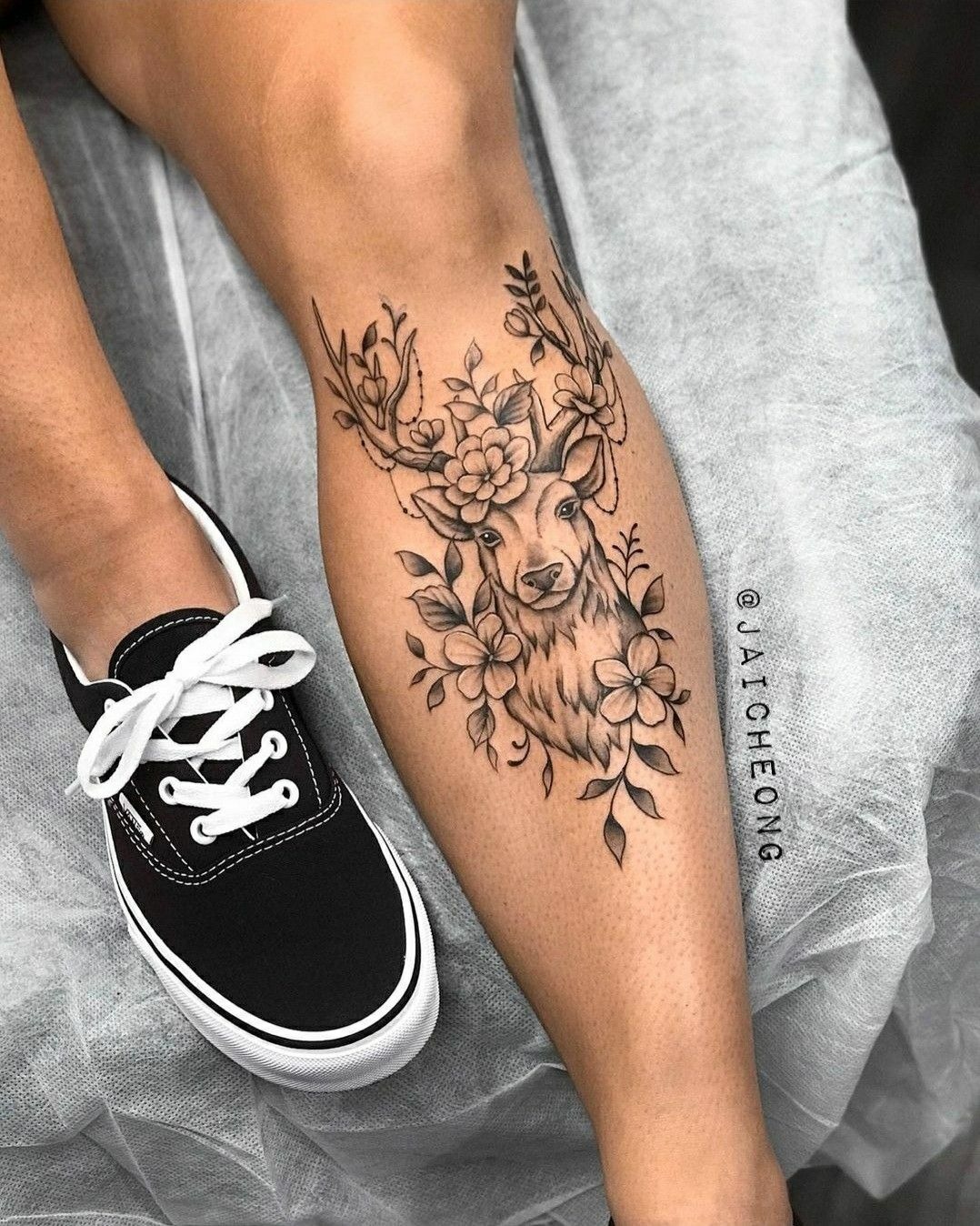 Whimsical Floral Deer Tattoos, a tattoo design rendered in clean detailed linework for the arm.