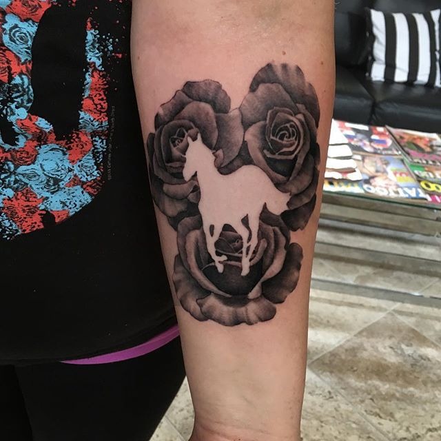 Horse Silhouette Framed by Roses Tattoo Design
