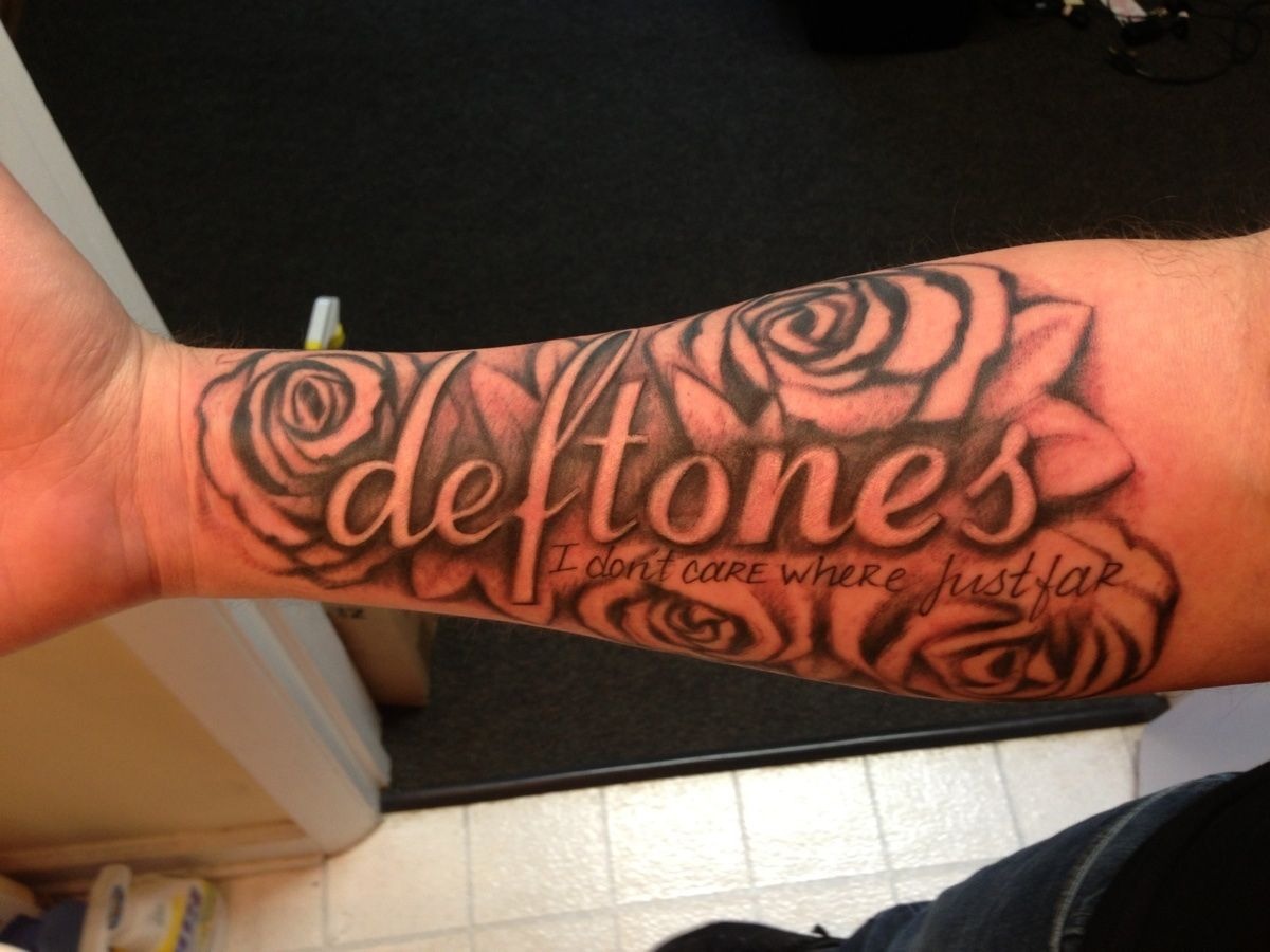 Script and Roses with Lyrics Statement Tattoo Design
