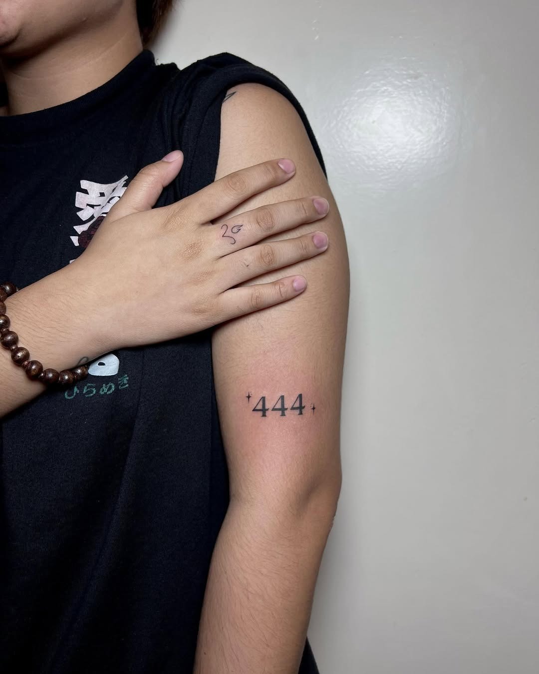 Meaningful 444 Tattoo on an Arm Tattoo Design