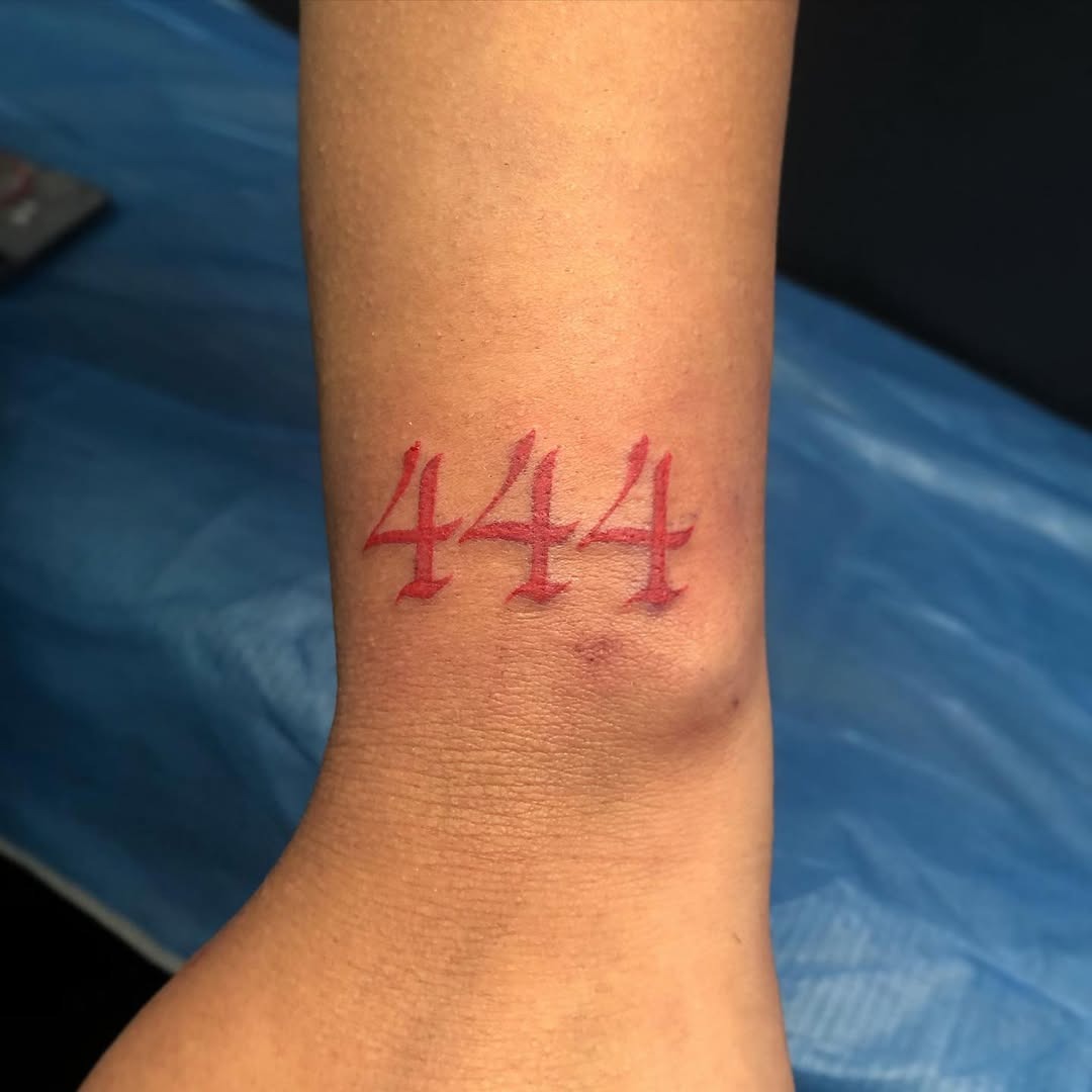 Minimalist 444 Tattoo in Vibrant Red Ink Tattoo Design