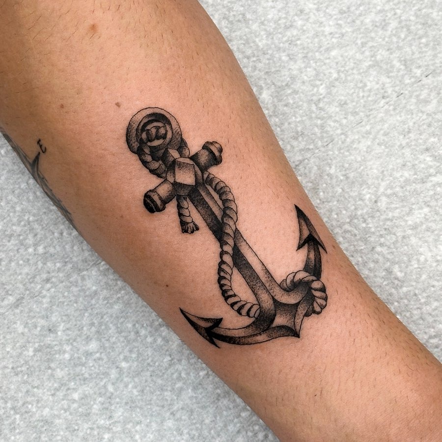 Classic anchor tattoo with intricate rope details Tattoo Design