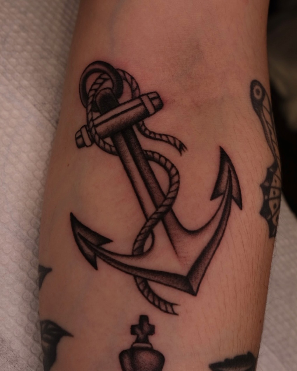 Intricately detailed anchor tattoo with rope Tattoo Design