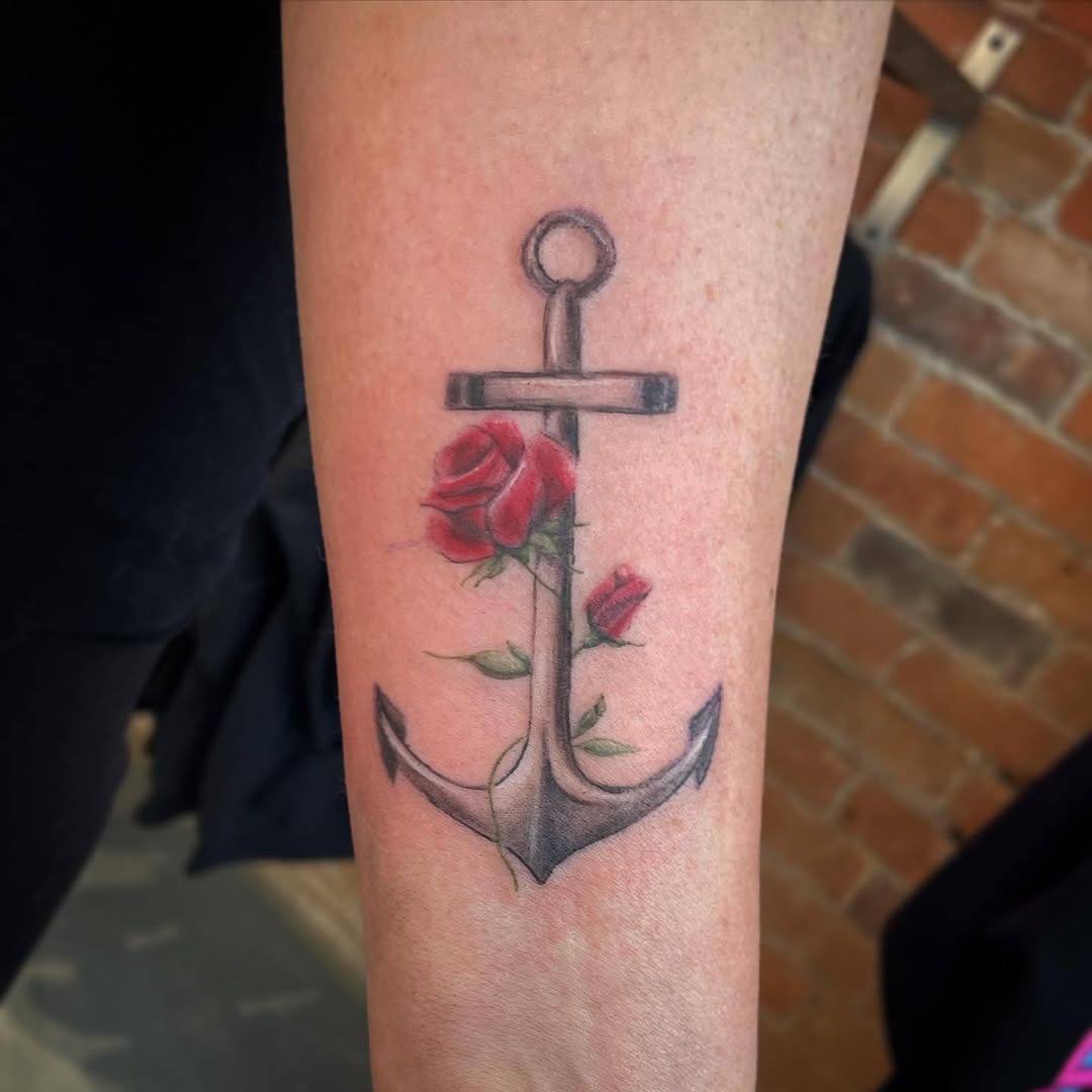 Stylish anchor tattoo adorned with a rose Tattoo Design