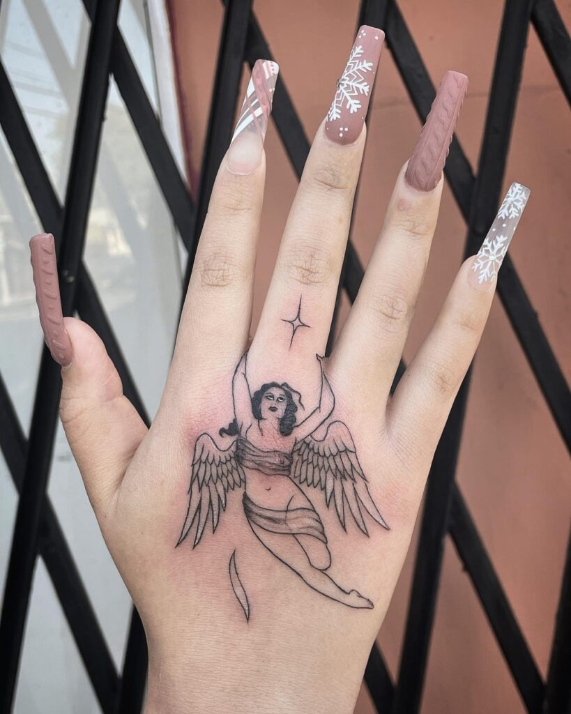 Elegant Flying Angel Hand Tattoo Tattoo Design