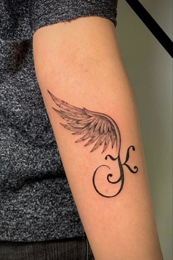 Initial With Angel Wing Arm Tattoo Tattoo Design