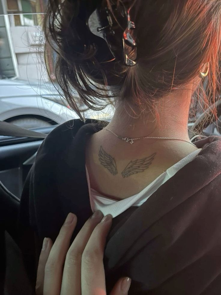 Minimal Back Neck Angel Wings Tattoo Design