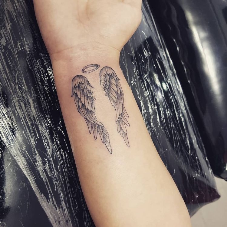 Wrist Wings With Halo Tattoo Tattoo Design
