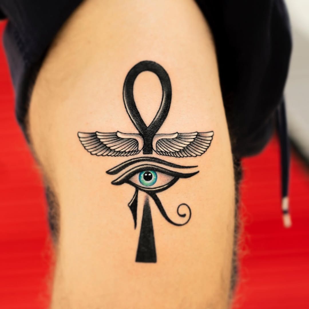 A stunning blend of ankh and Eye of Horus Tattoo Design