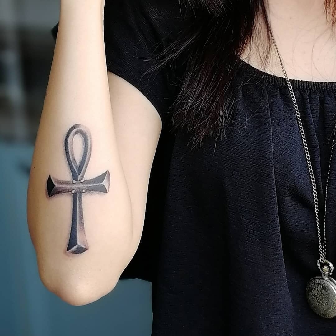 Elegant ankh tattoo on a woman's arm Tattoo Design