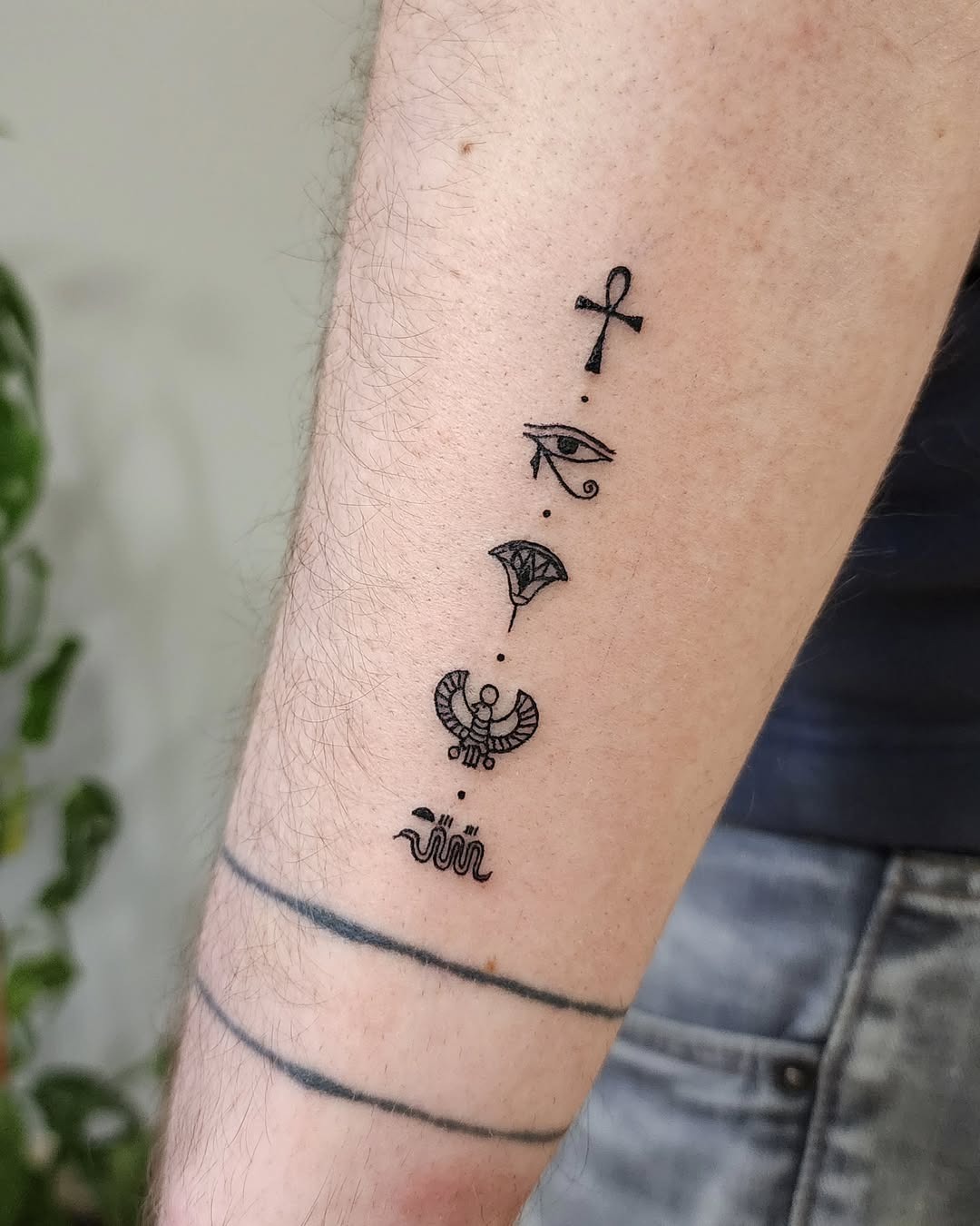 Elegant winged ankh tattoo design on chest Tattoo Design