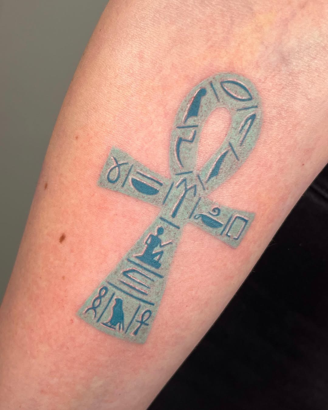 Intricate ankh tattoo with hieroglyphics design Tattoo Design