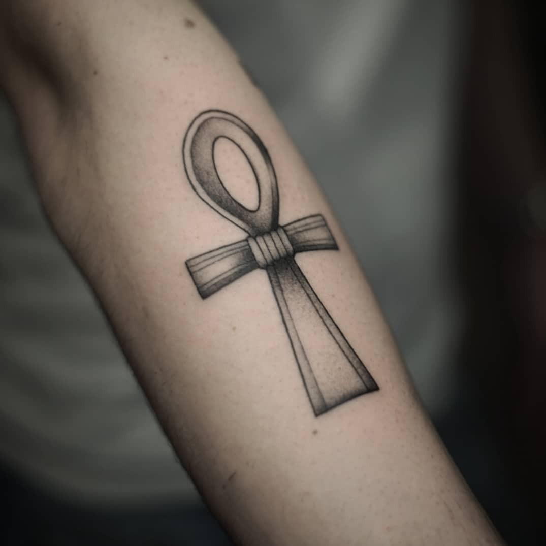 Stylized ankh tattoo with intricate detailing Tattoo Design