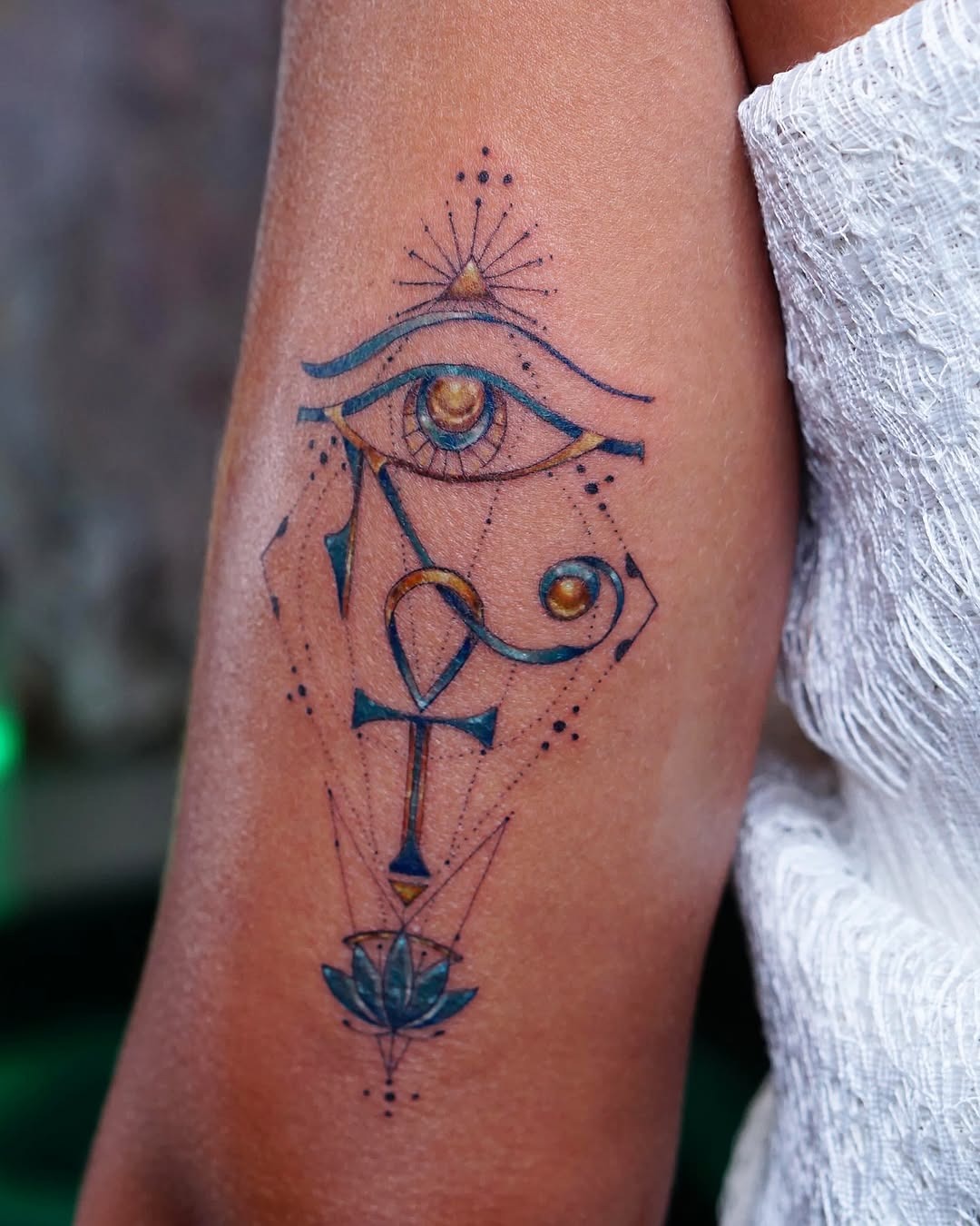 Symbolic ankh tattoo with Eye of Horus Tattoo Design