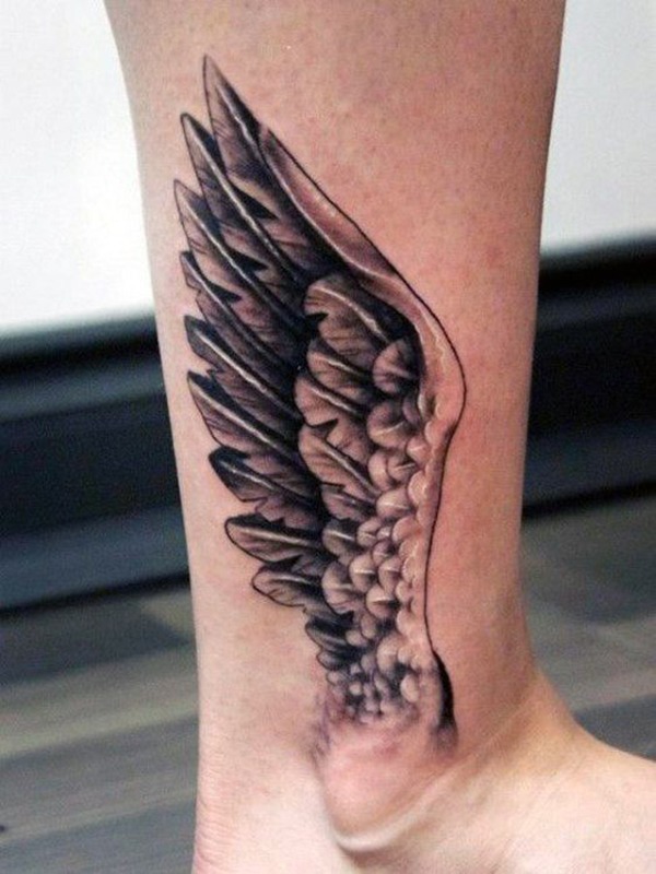 Ankle Tattoo Idea: Small Gray Wings Sprouting From Ankle Tattoo Design