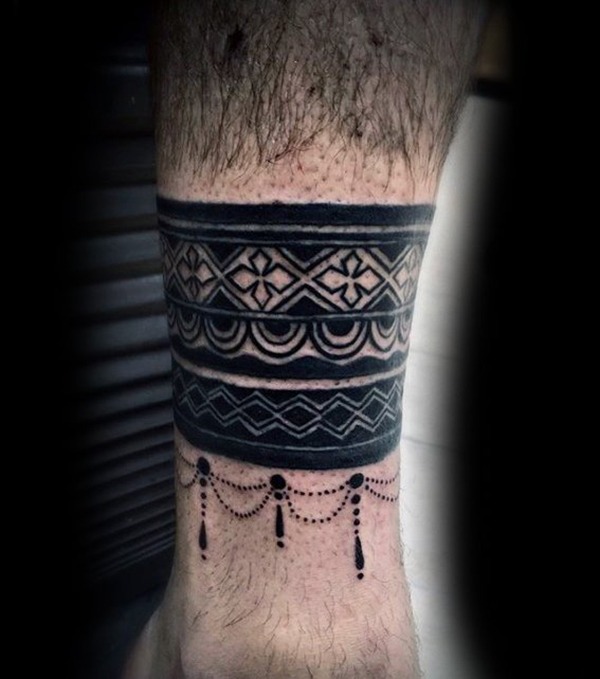 Bands of Several Patterns and Draping Beads Tattoo Design