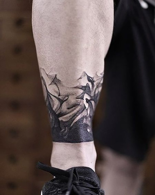 Delicate Swirls of Black Rising Leg ankle tattoo Tattoo Design