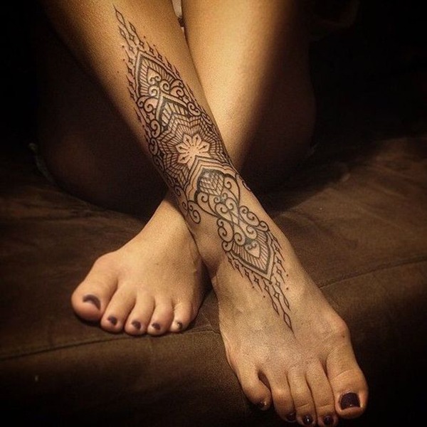 Intricate Patterns Over Ankle and Foot Tattoo Design