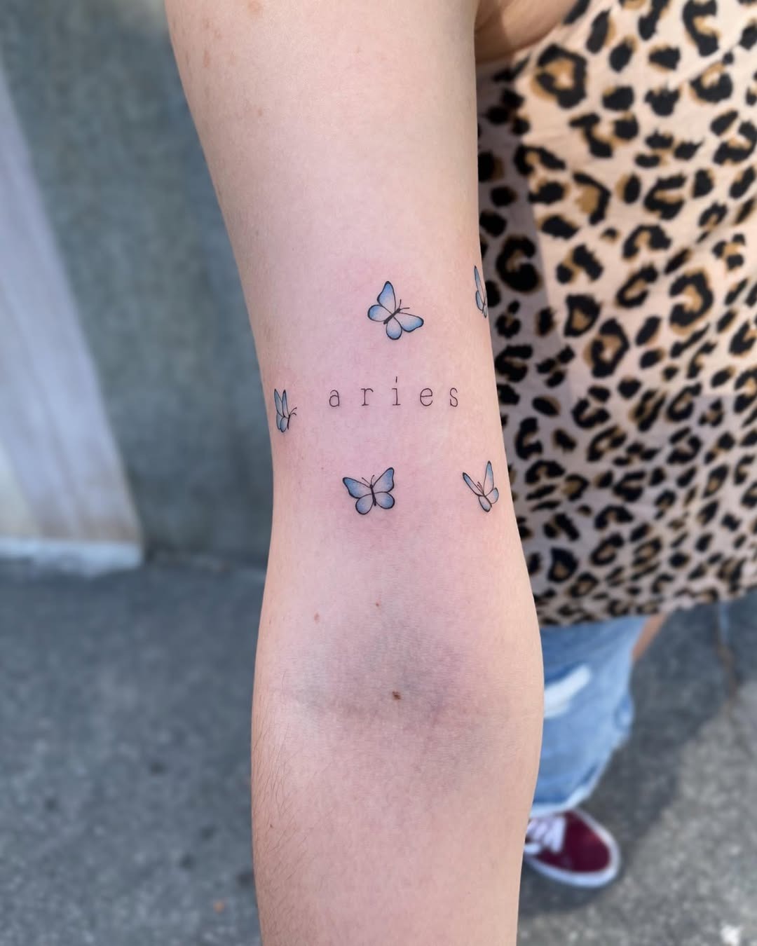 Elegant Aries Butterfly Tattoo Design with Text Tattoo Design