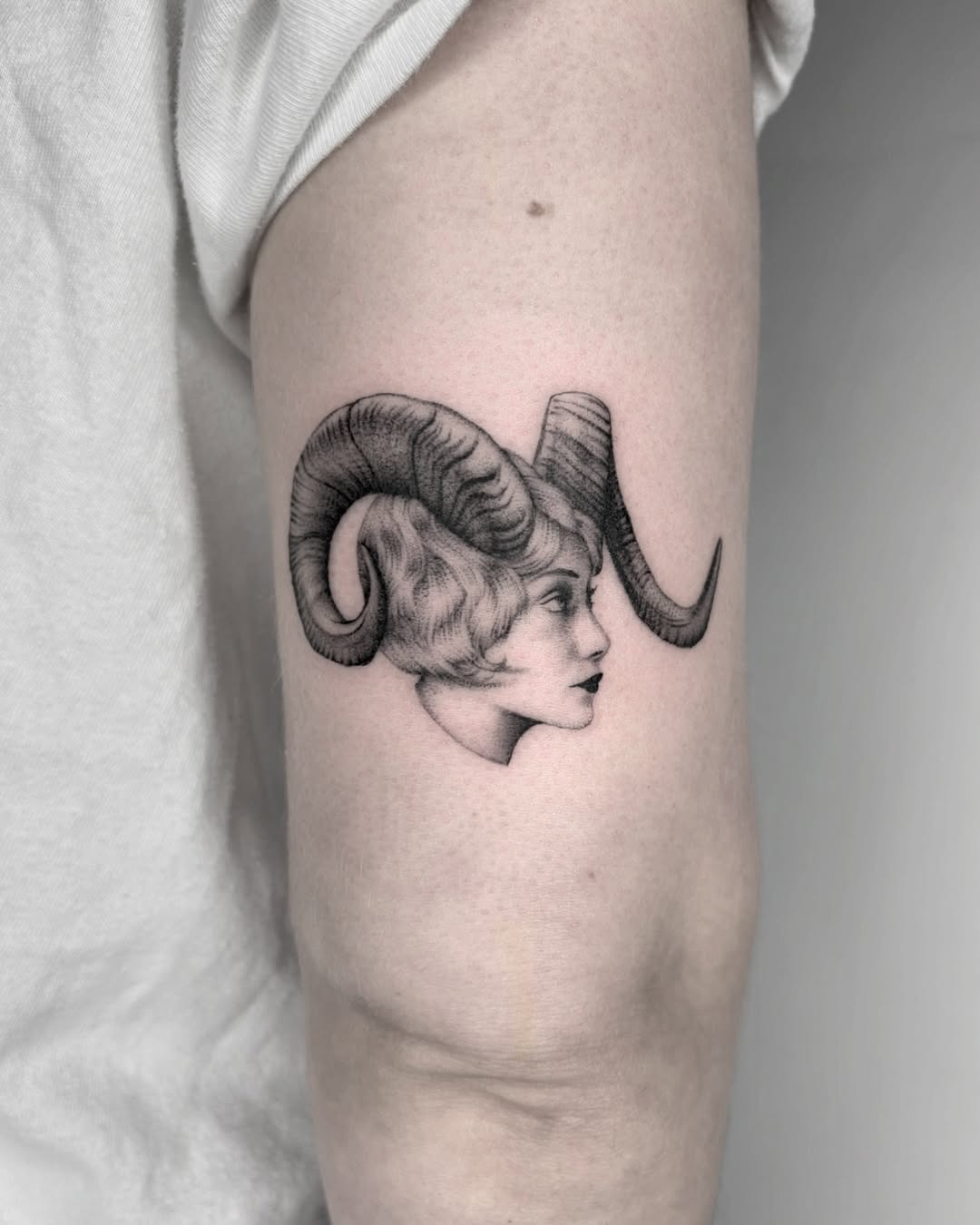 Elegant Aries Tattoo Featuring Horned Profile Tattoo Design