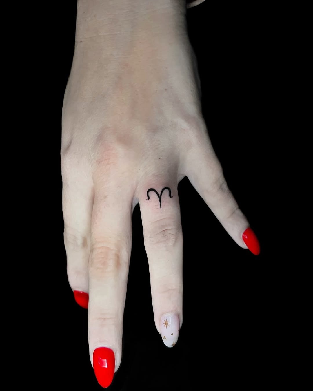 Elegant Aries tattoo on a graceful hand. Tattoo Design