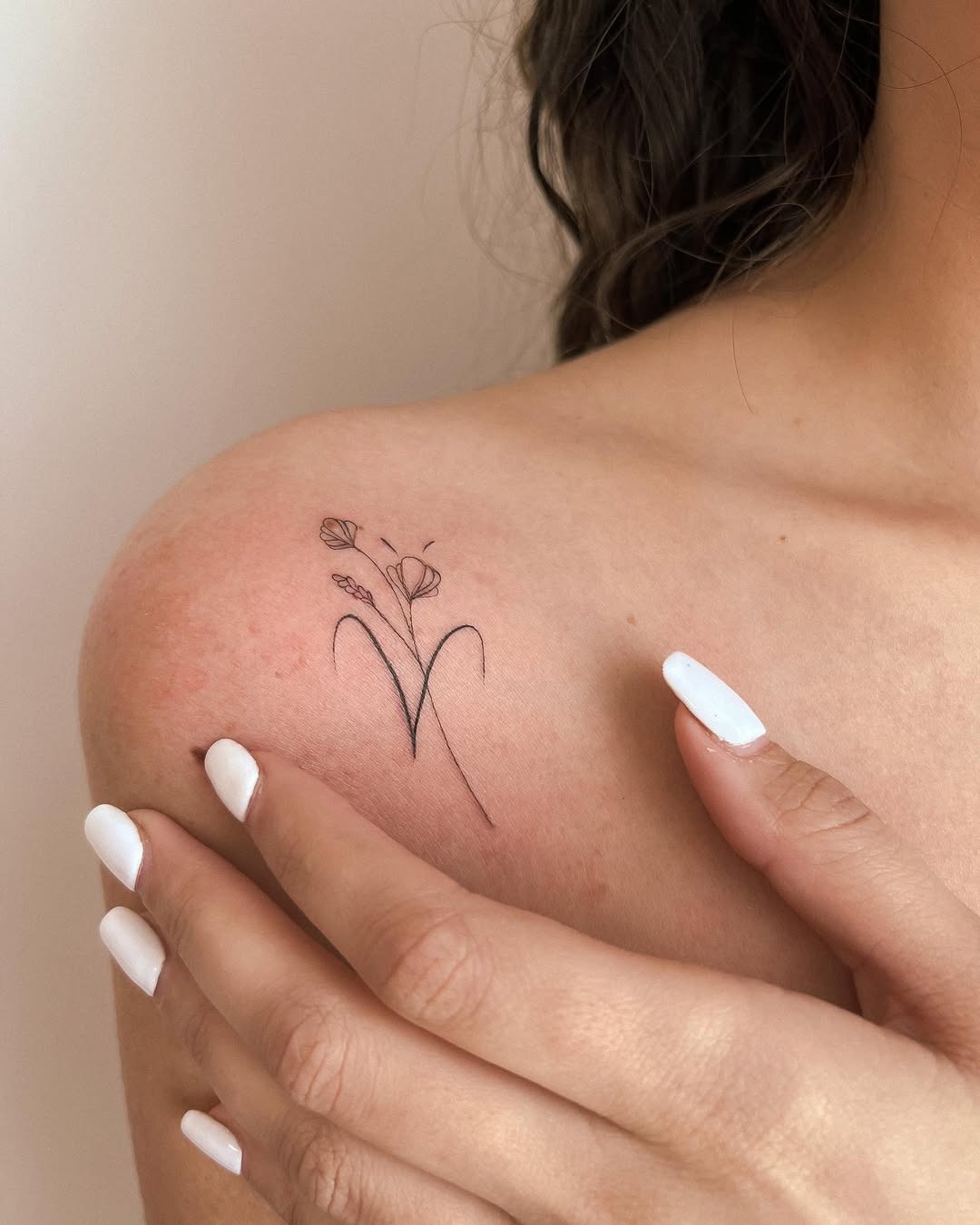 Elegant Floral Tattoo on Shoulder Tattoo Design