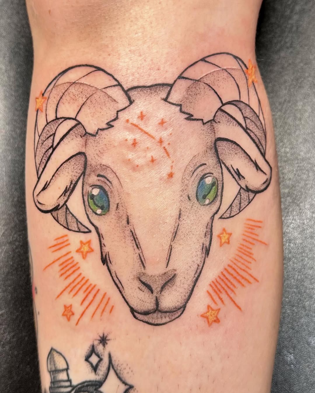 Eye-catching Aries ram tattoo with cosmic elements Tattoo Design
