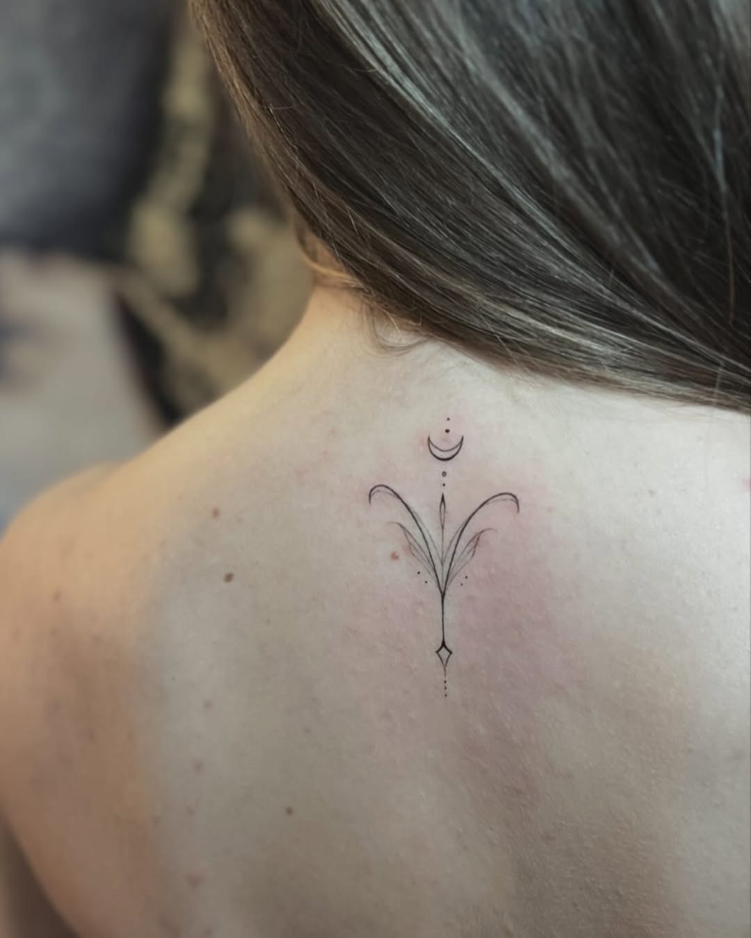 Minimalist Aries-Inspired Floral Tattoo Design Tattoo Design