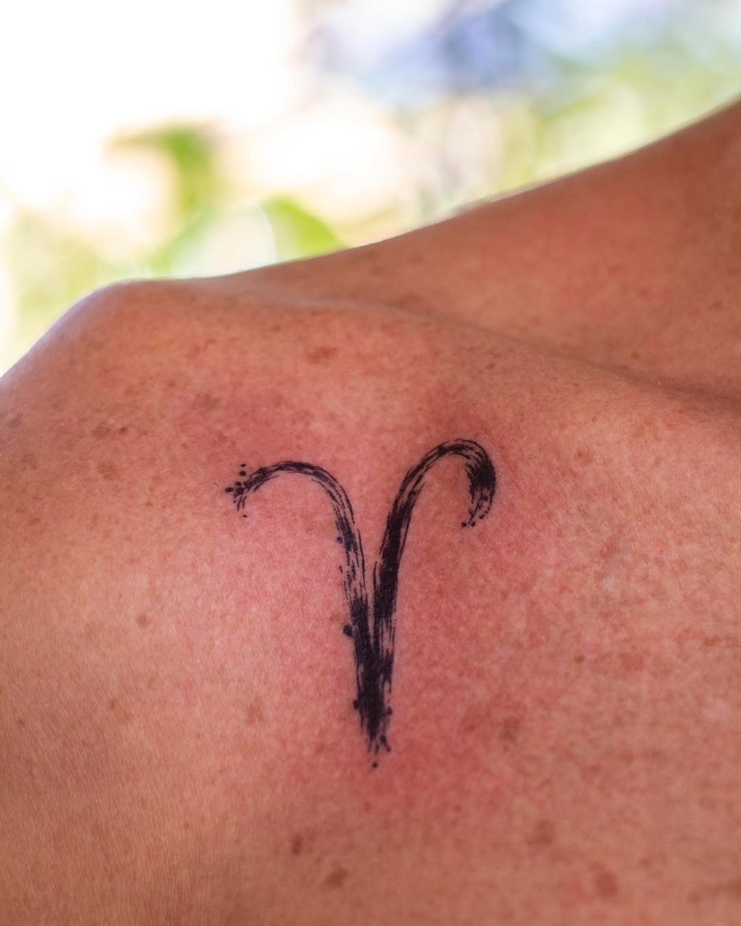 Stylish Aries Symbol for Bold Self-Expression Tattoo Design