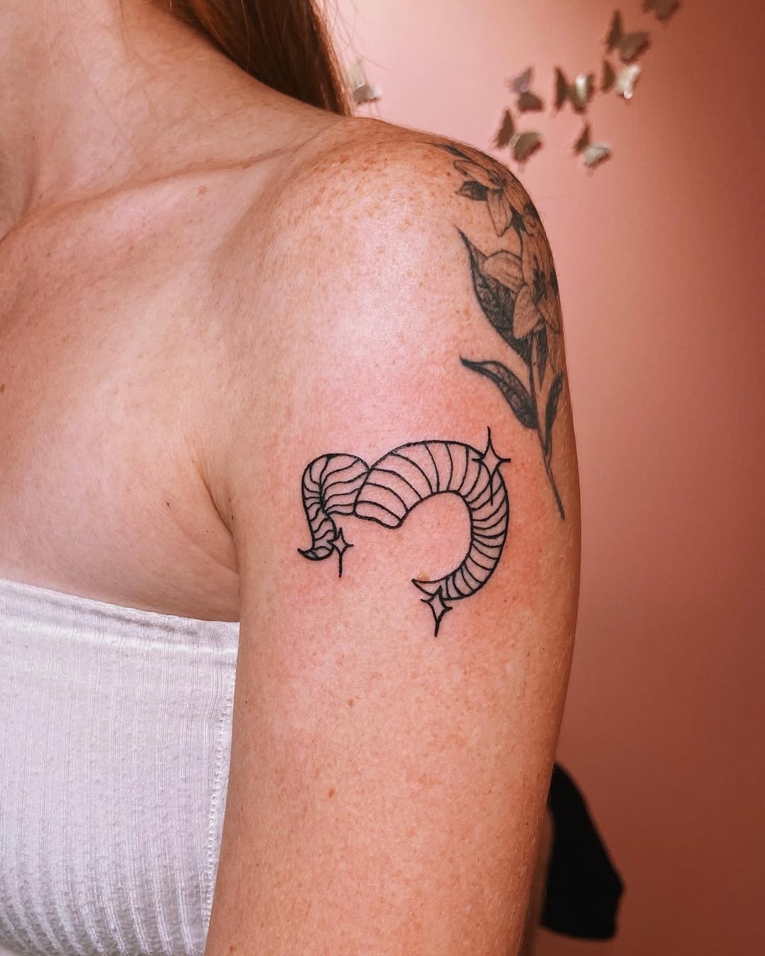 Stylish Aries tattoo with cosmic elements Tattoo Design